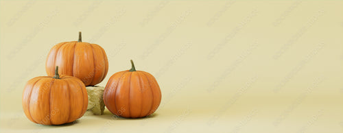 Seasonal background Banner with copy-space. Trio of Pumpkins on Pale Yellow color. Autumn Concept.