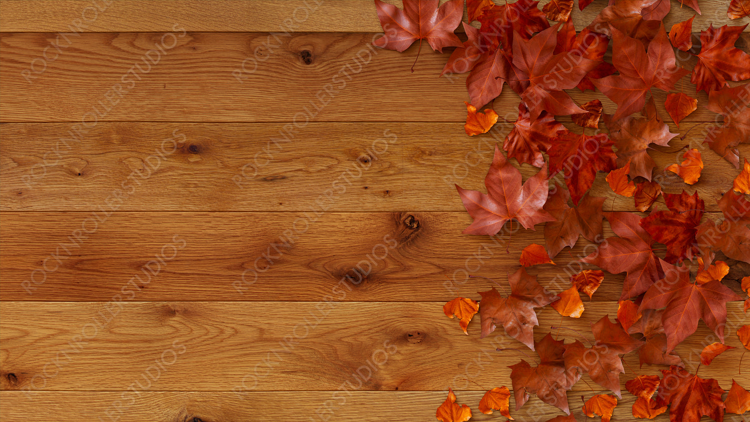 Thanksgiving Wallpaper with Autumn leaves on Natural wood Tabletop.