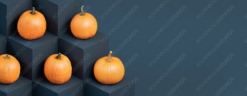 Contemporary Fall Banner with Pumpkins on Blue Grey Cubes.