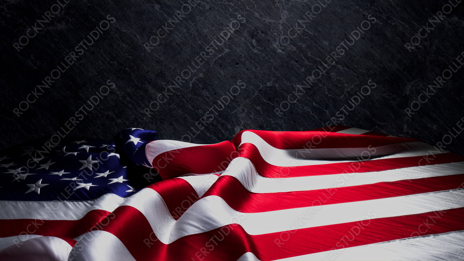 Premium Banner for Patriot Day with US Flag, Black Stone Background and Copy-Space.